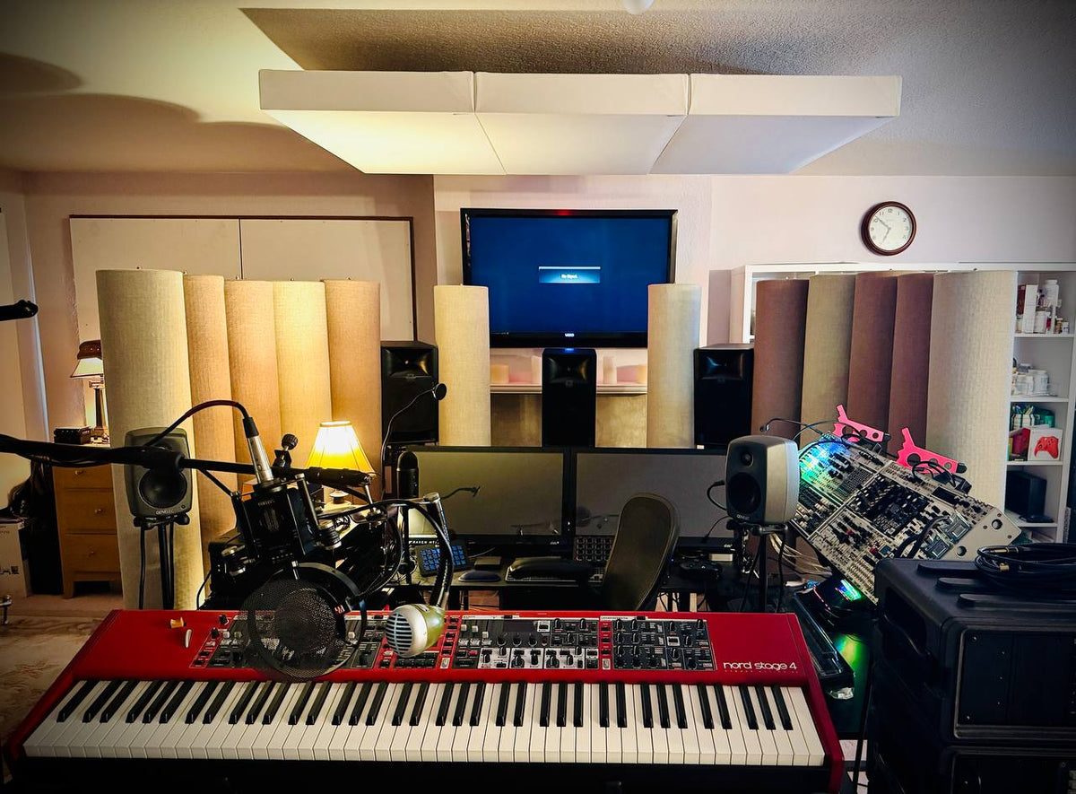 Acoustic ceiling cloud installation over mixing desk Seattle