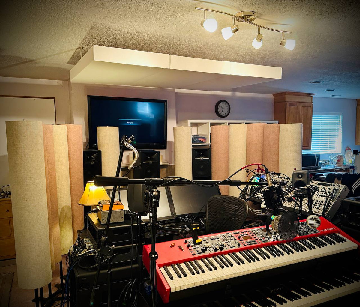 Acoustic ceiling cloud installation over mixing desk Seattle